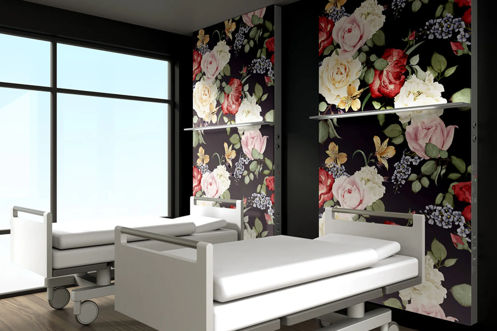 Two white hospital beds in front of a rear wall with a large-scale floral pattern and a window with a view of the sky